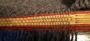 Tablet woven band showing the tablets separating.